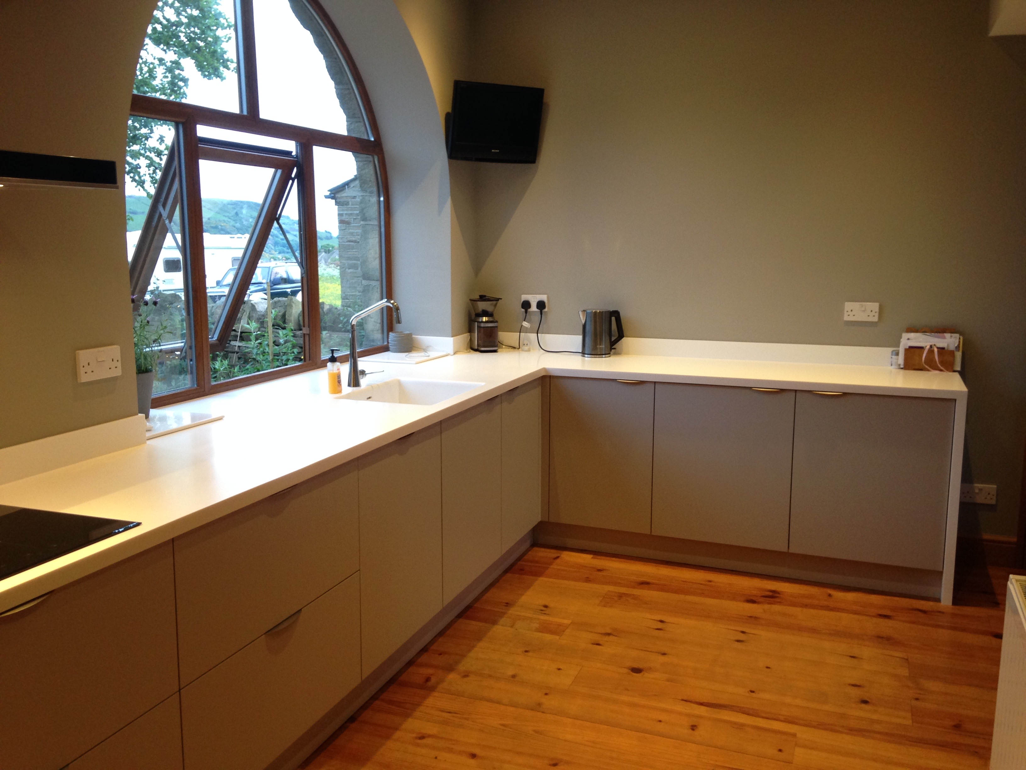Luxury Fitted Kitchen In Halifax, supermatt grey doors and corian worktop