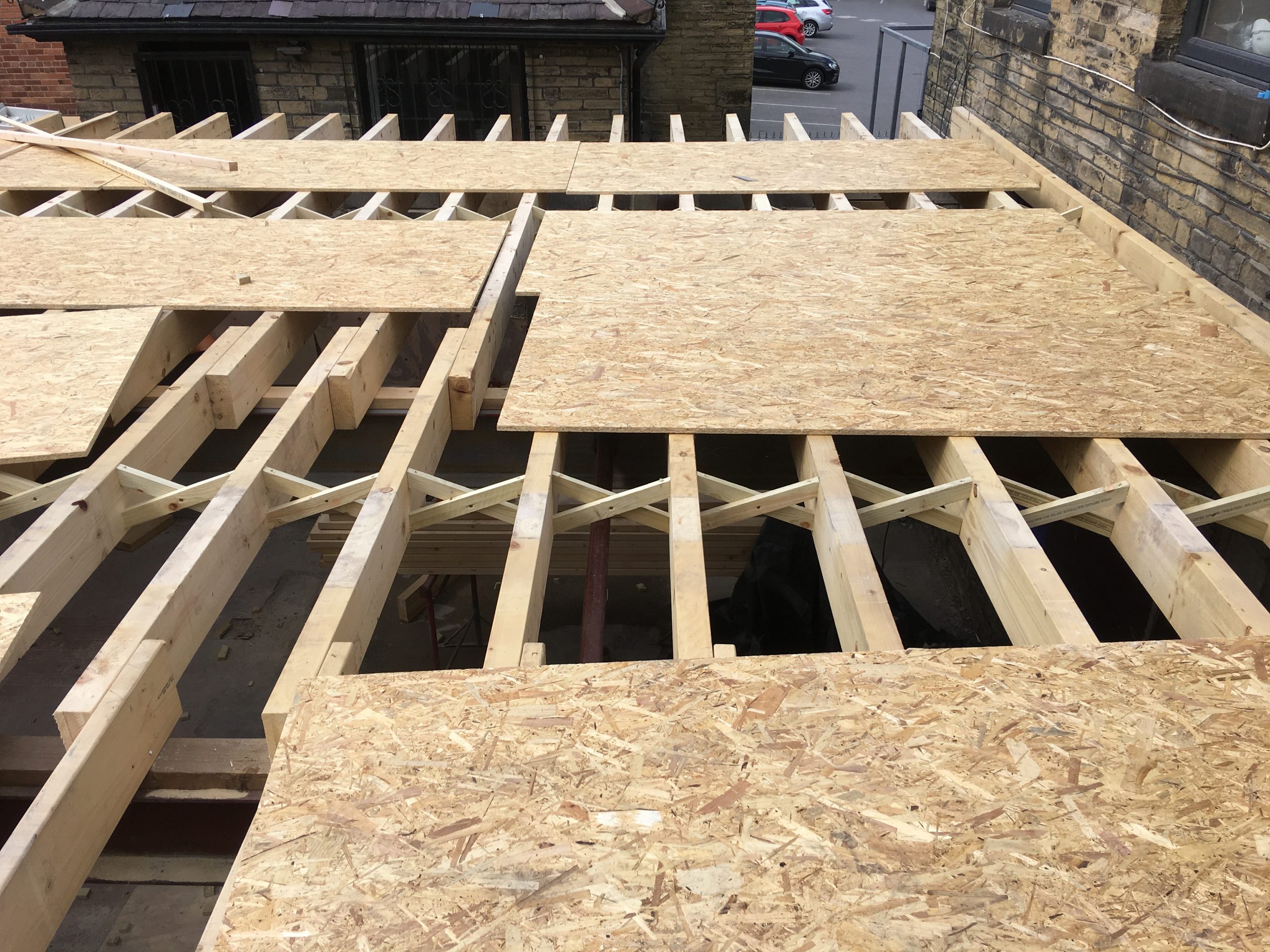 Flat roof with herringbone strutting