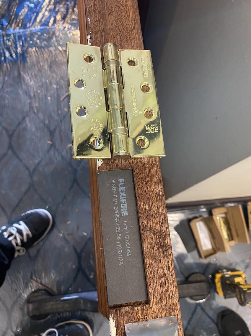 Flexifire hinge pads being installed